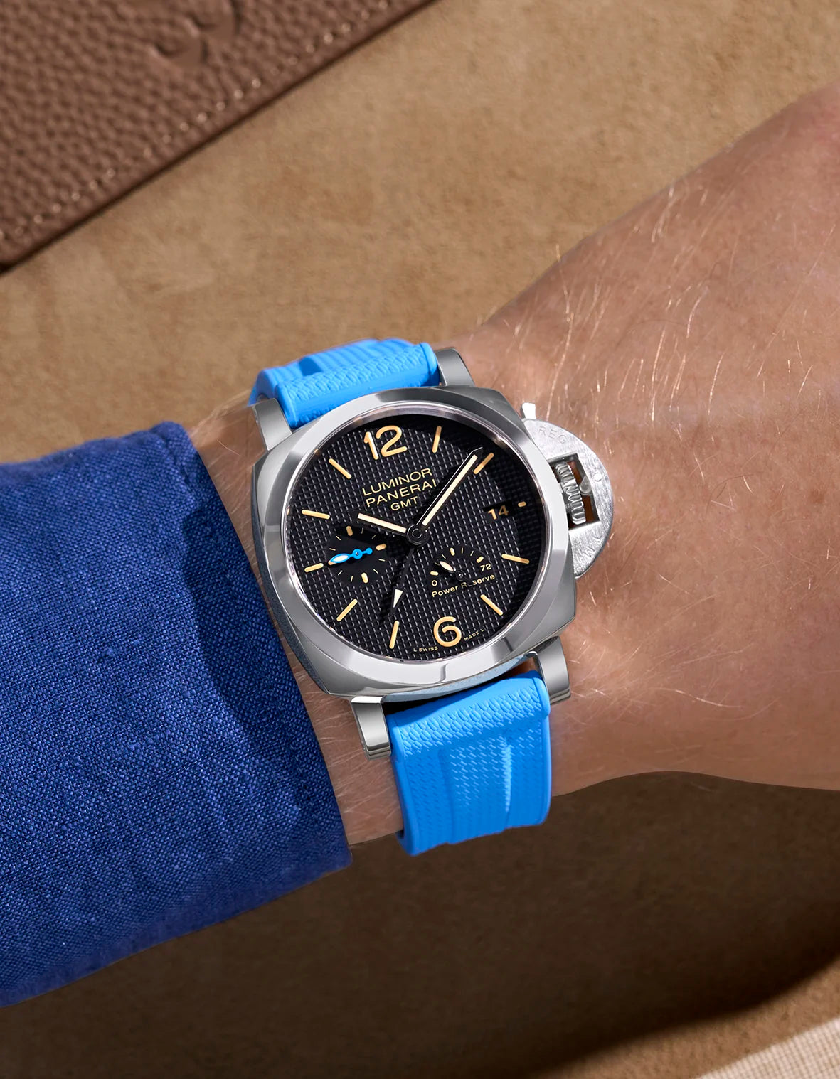 Wrist shot showing Capri Blue Vertech FKM rubber strap on Panerai Luminor GMT