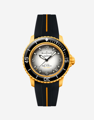 Blancpain Swatch Pacific Ocean diver watch shown with black and yellow rubber strap attached
