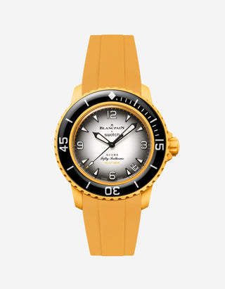 Blancpain X Swatch Pacific Ocean displayed from the front with yellow rubber strap mounted