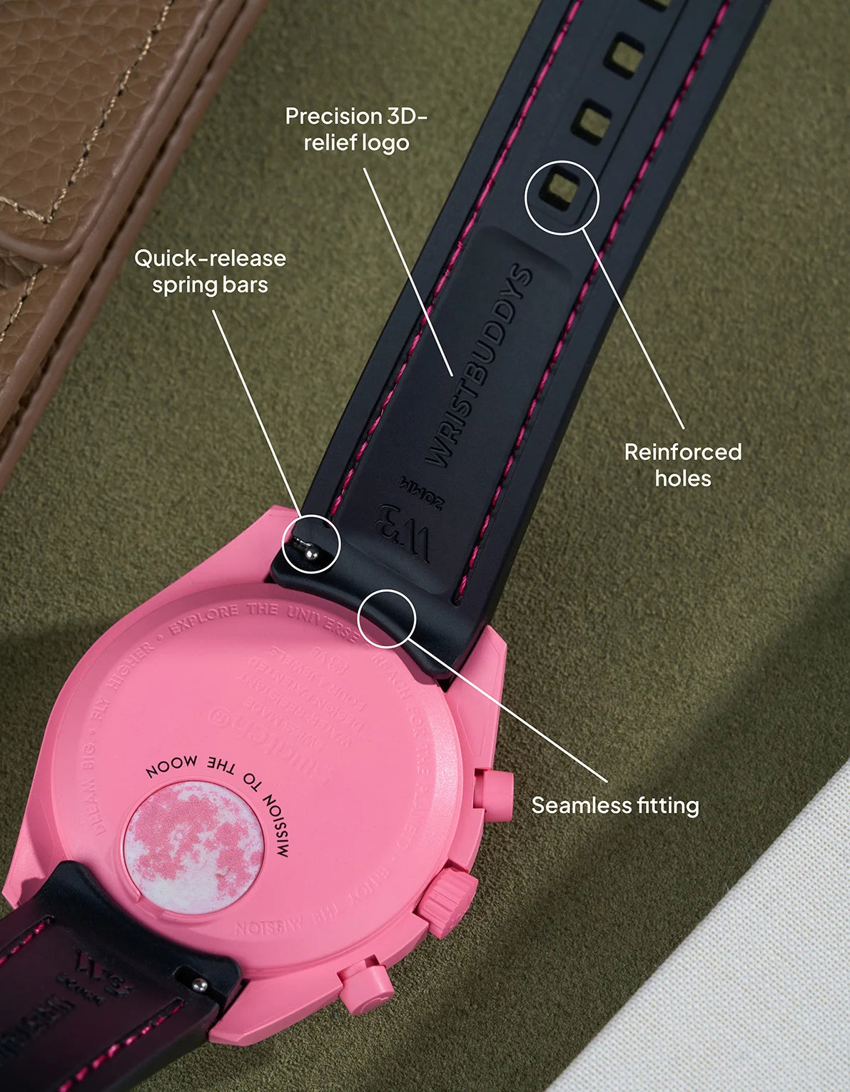 Black curved rubber strap with pink stitching, seamless case integration, quick-release spring bars and precision logo detailing