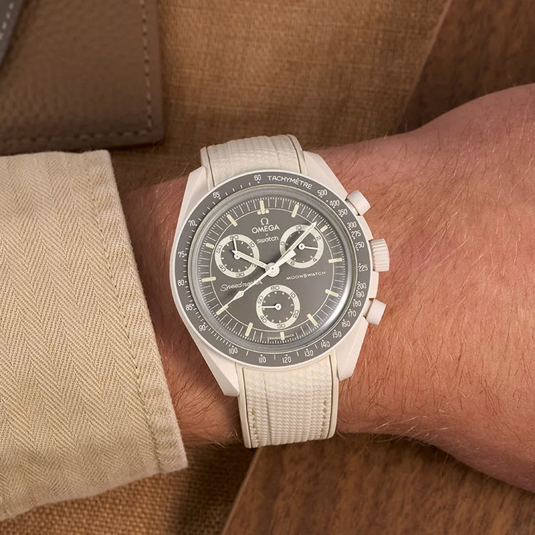Omega X Swatch MoonSwatch Mission on Earth Desert with a rubber strap, showcasing a clean and sophisticated design, available from Wristbuddys.