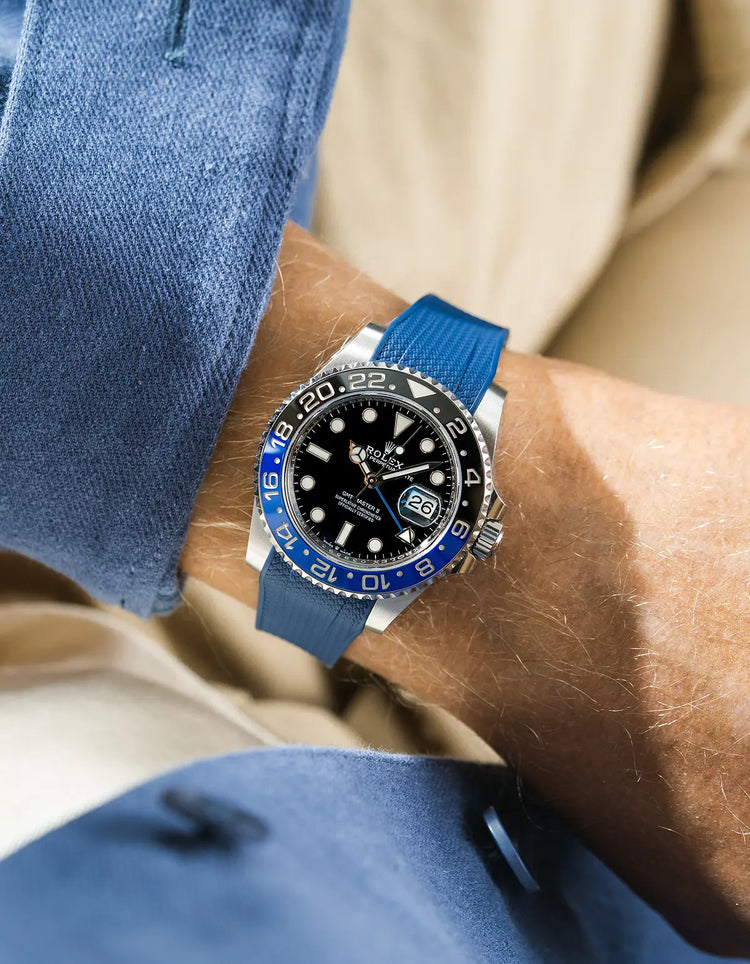 Premium blue rubber watch strap worn on wrist with Rolex GMT-Master II Batman