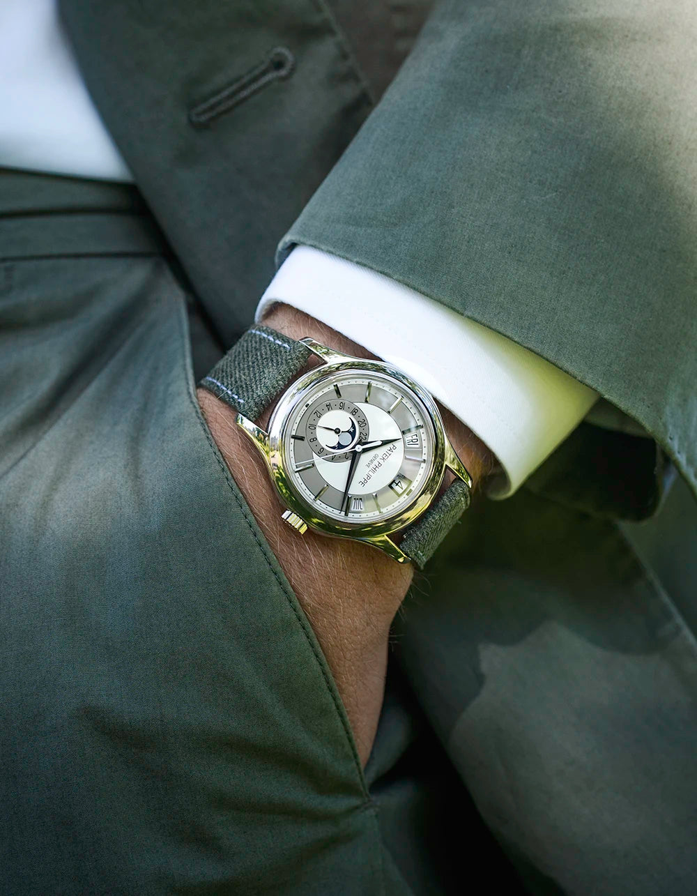 Military Green Denim Strap on Patek Philippe – wrist shot styled with suit