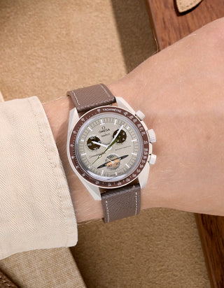 Grey Epsom leather strap on Omega X Swatch MoonSwatch Mission to Saturn – wrist shot