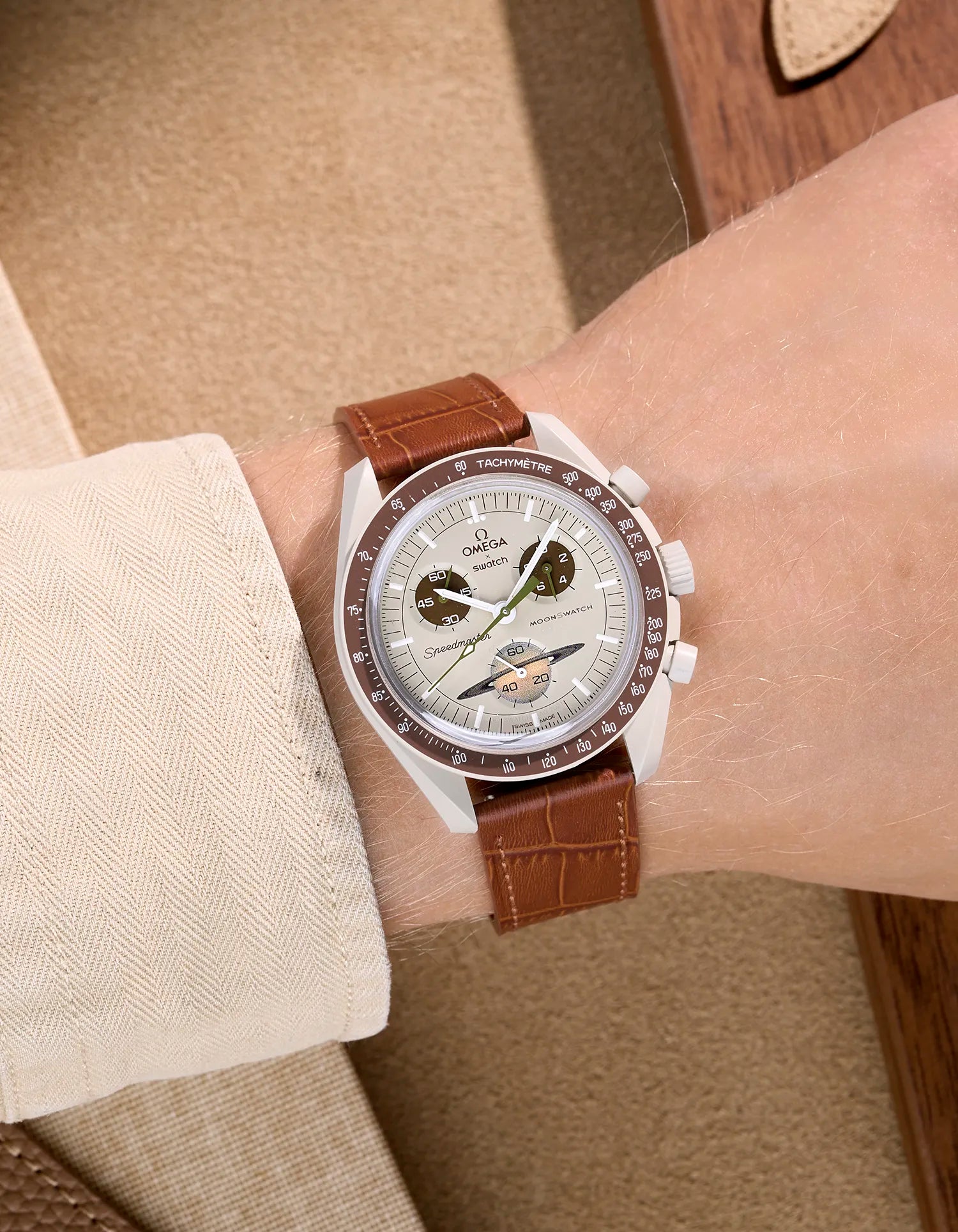 Light Brown embossed alligator leather strap on Omega X Swatch MoonSwatch Mission to Saturn – wrist shot