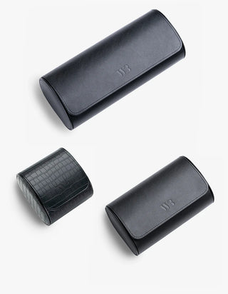 Three Wristbuddys watch rolls in black premium leather with embossed WB logo — shop watch rolls at Wristbuddys