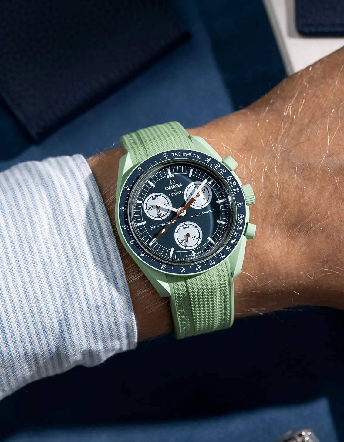 MoonSwatch Mission on Earth with mint green curved rubber strap – wrist shot