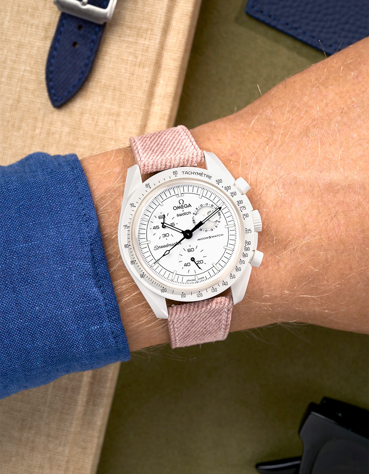 Omega X Swatch MoonSwatch Mission to the Full Moonphase on wrist with pink denim strap