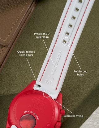 White rubber strap with red stitching for Omega x Swatch MoonSwatch Mission to Mars featuring precision 3D-logo, reinforced adjustment holes and a secure fit.