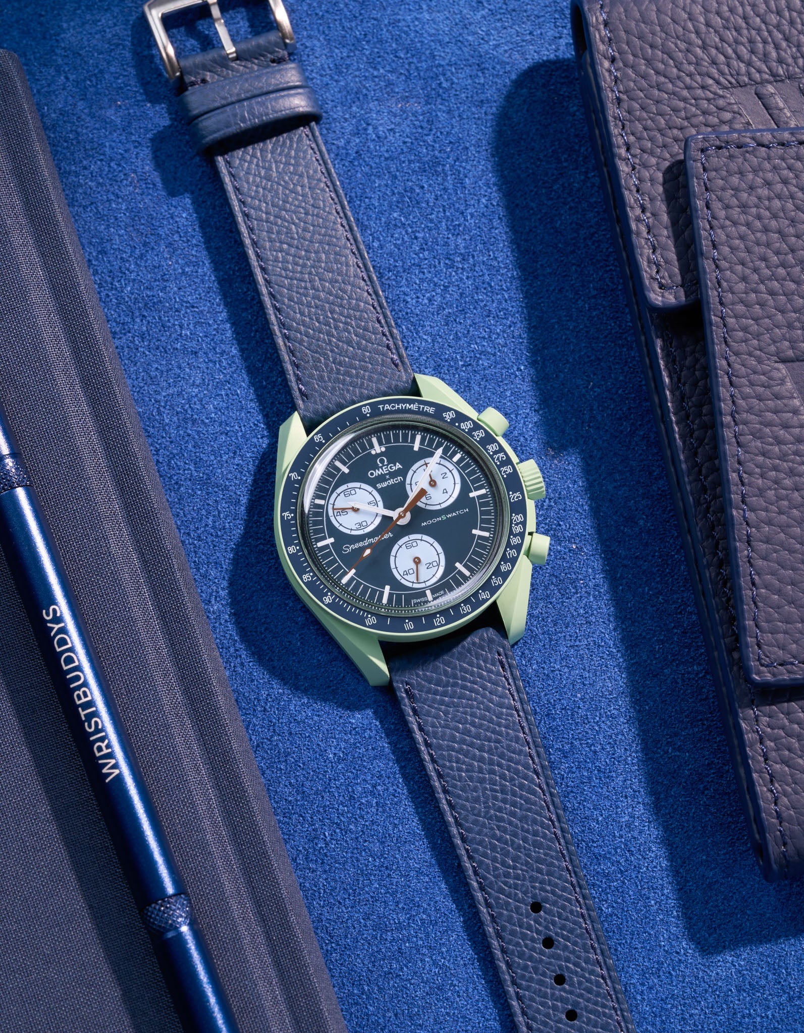 Flat lay of Navy Blue Epsom leather strap for Omega x Swatch MoonSwatch Mission on Earth