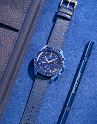Flat lay of Navy Blue Epsom leather strap for Omega x Swatch MoonSwatch Neptune