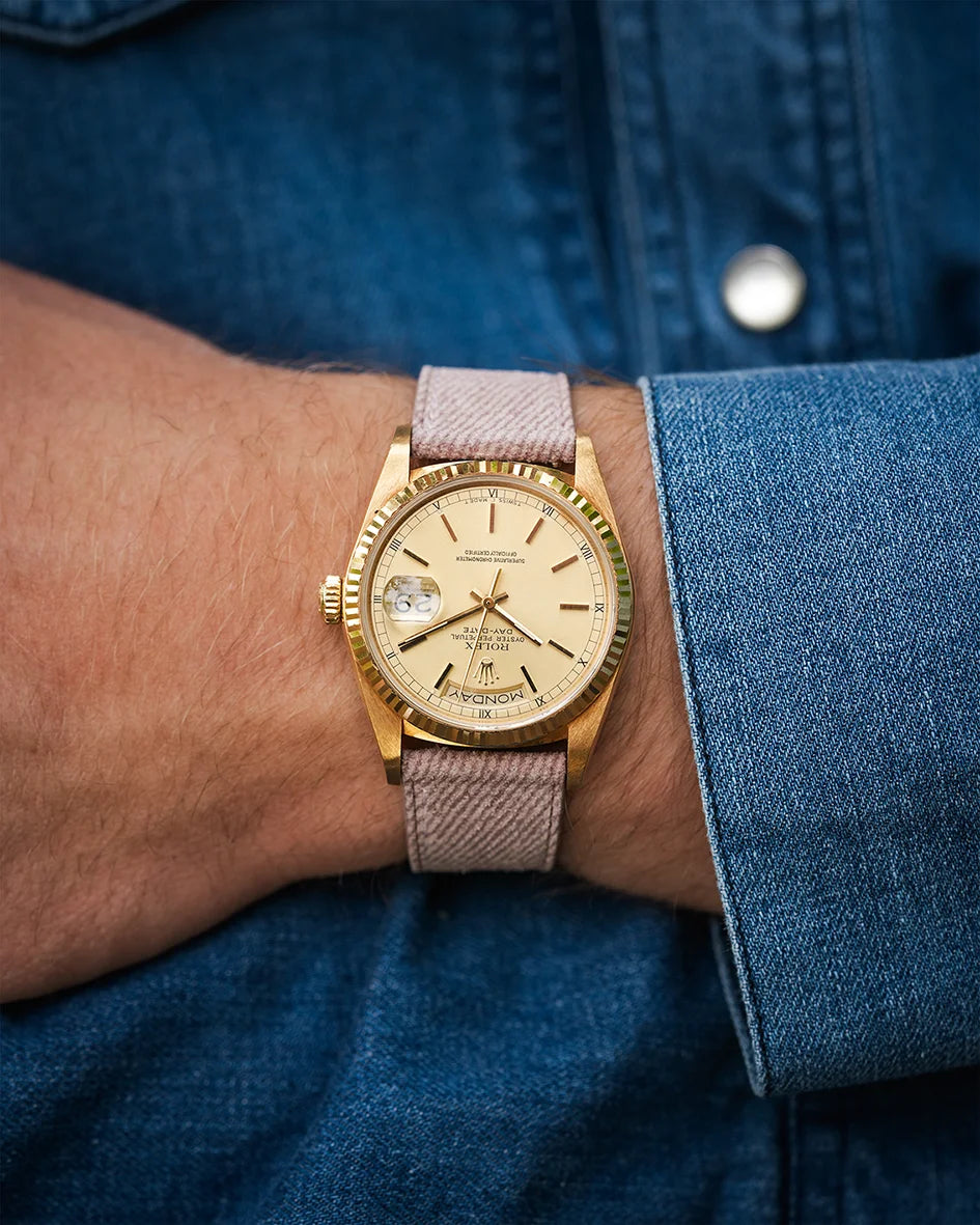 Pink Denim Watch Strap on gold Rolex Datejust – wrist shot with champagne dial and denim shirt