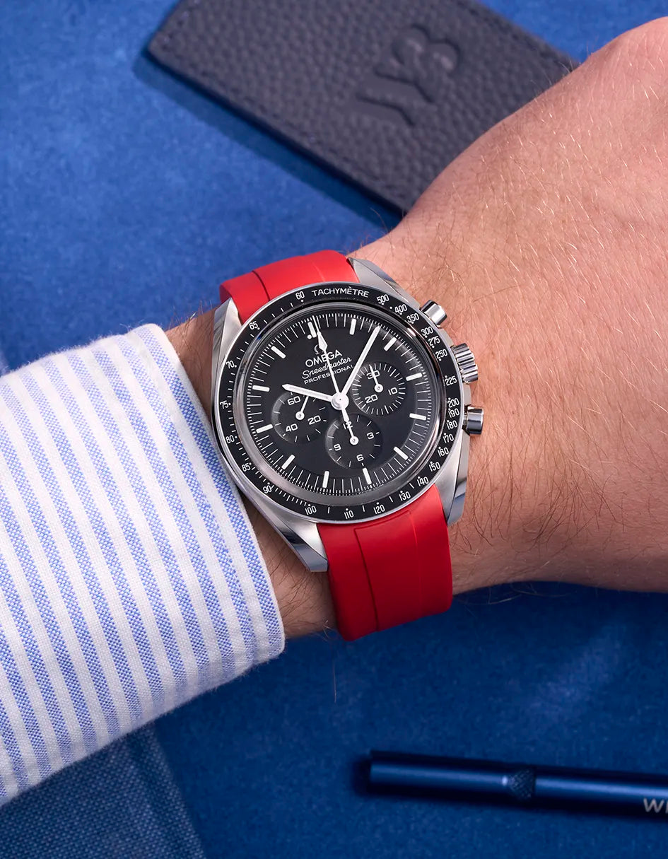 Red FKM rubber strap on Omega Speedmaster – wrist shot showing watch on wrist