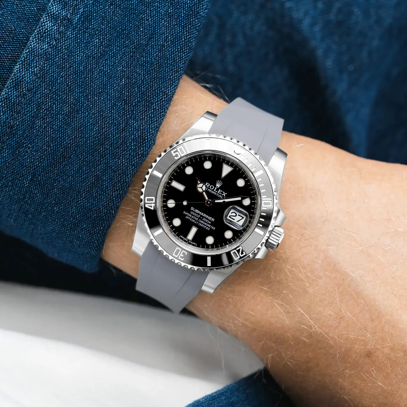 Rolex Submariner with an grey rubber strap, specially designed for a perfect fit and durability, available at Wristbuddys.