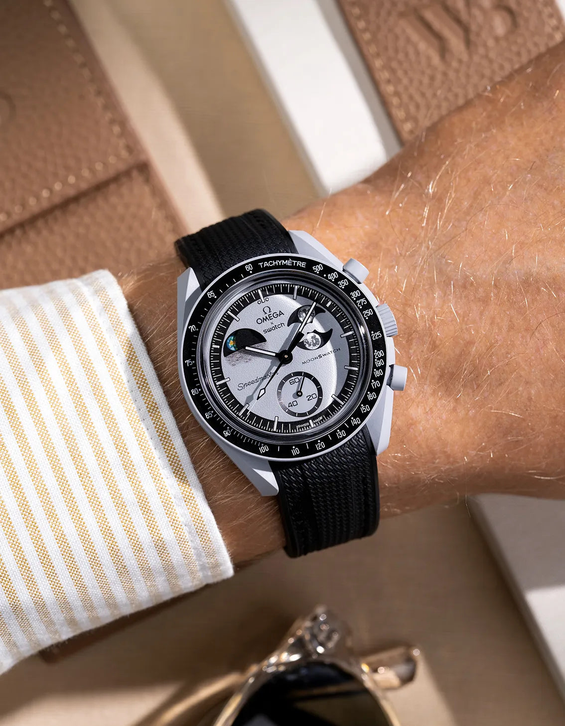 Black curved vertech rubber strap for MoonSwatch – wrist shot on Mission to the EarthPhase