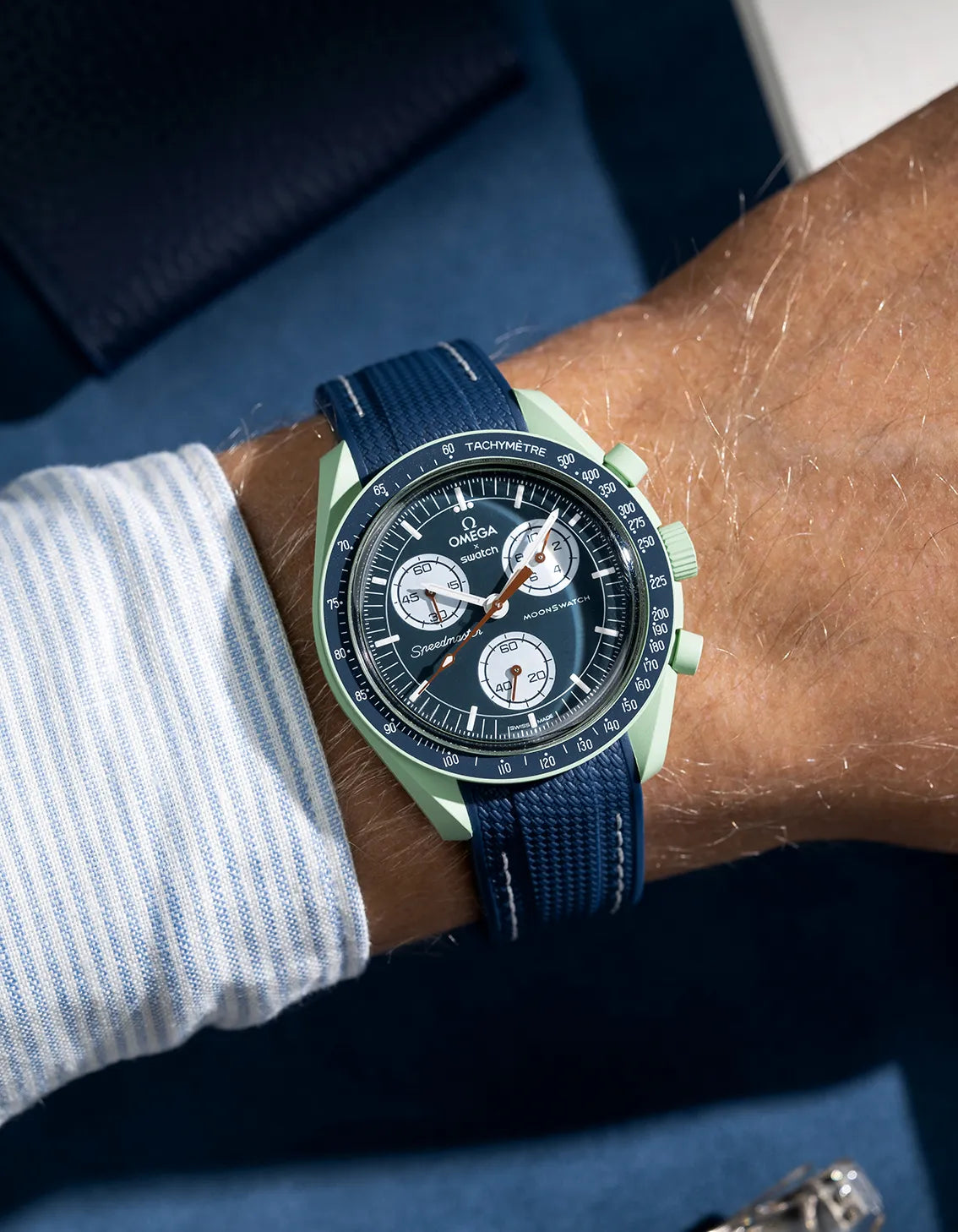 navy blue with white stitches rubber strap for MoonSwatch, photographed on Mission on Earth – navy blue with white stitches wrist shot