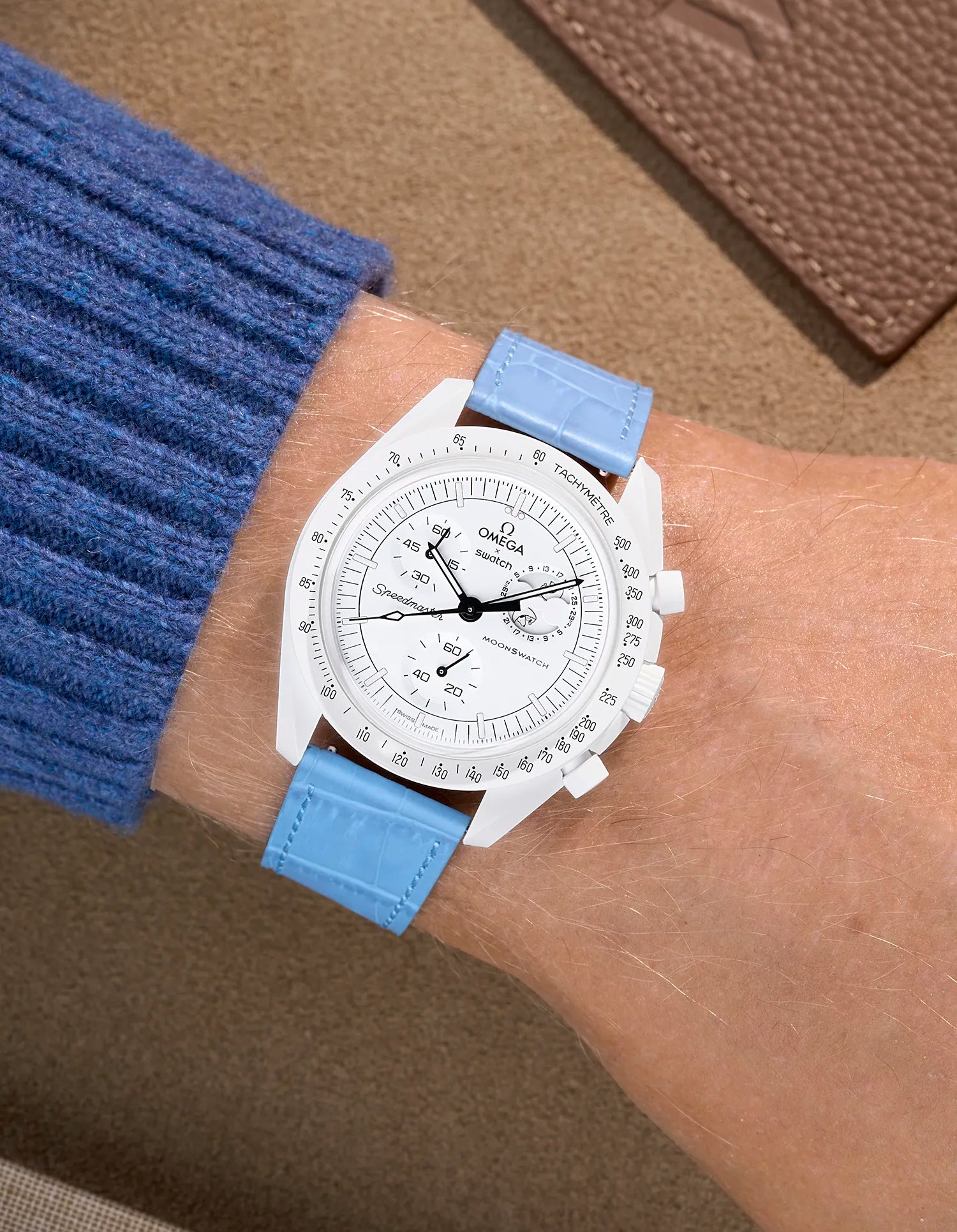 Sky blue embossed alligator leather strap on Omega X Swatch MoonSwatch Mission to the Moonphase Full Moon – wrist shot