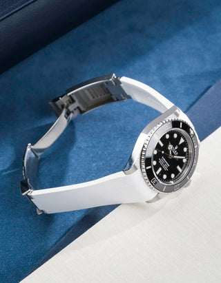 Rolex Submariner 41 with white Classic Smooth FKM Rubber Strap sitting on the watch, integrated with original clasp – product photo side angle with clasp open