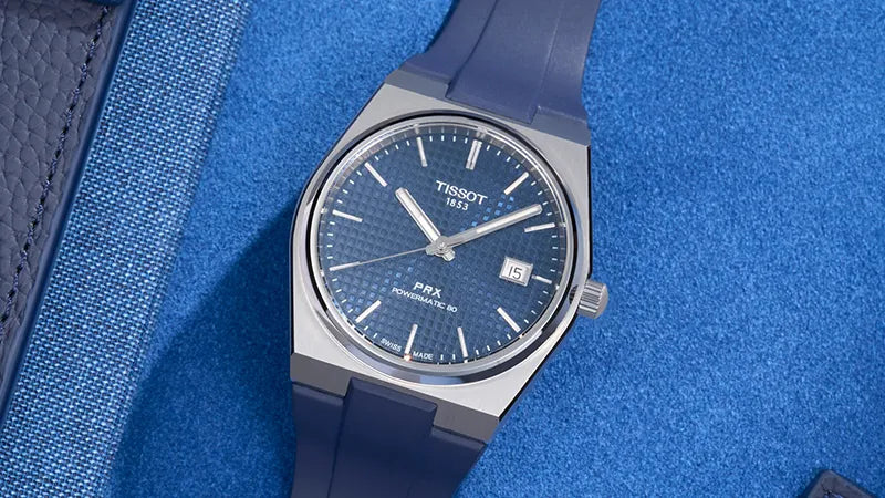 Tissot PRX with a blue rubber strap, part of Wristbuddys premium collection of straps for Tissot watches