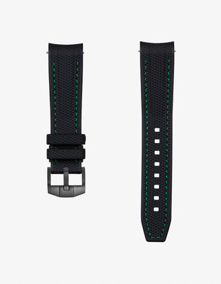 Black vertech watch strap with green stitching on a white background