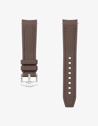Brown vertech rubber watch strap with silver buckle on a white background