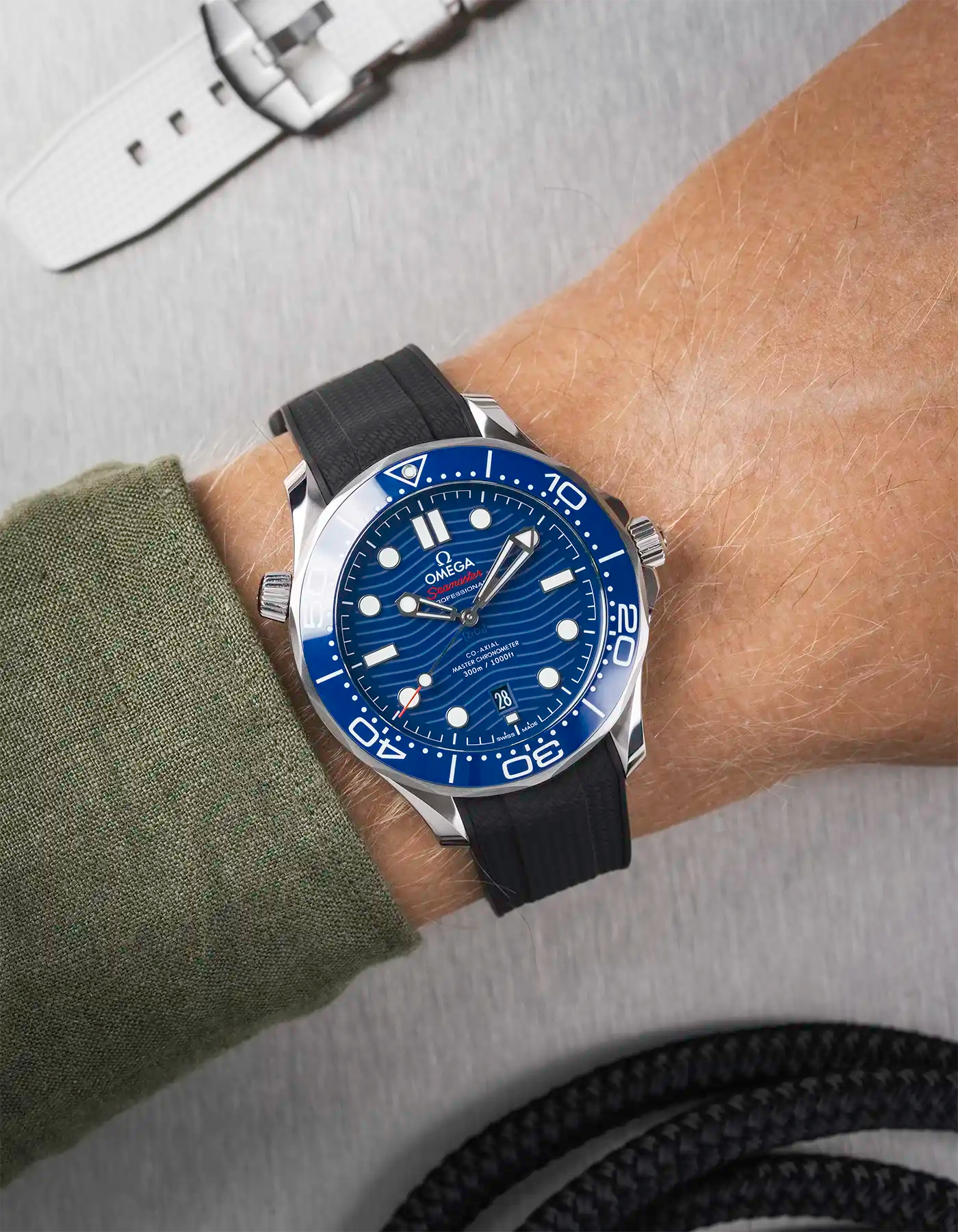 Omega Seamaster 300 Diver with blue dial on wrist, paired with black Vertech FKM rubber strap
