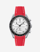 Omega X Swatch MoonSwatch 1965 watch with red strap and white face on a light gray background
