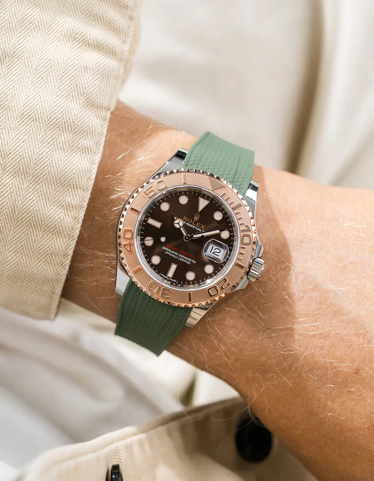 Premium green rubber watch strap worn on wrist with Rolex Yacht-Master