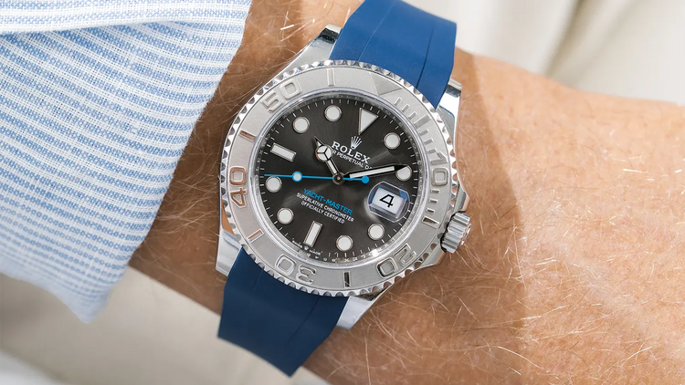 Premium blue rubber watch strap worn on wrist with Rolex Yacht-Master